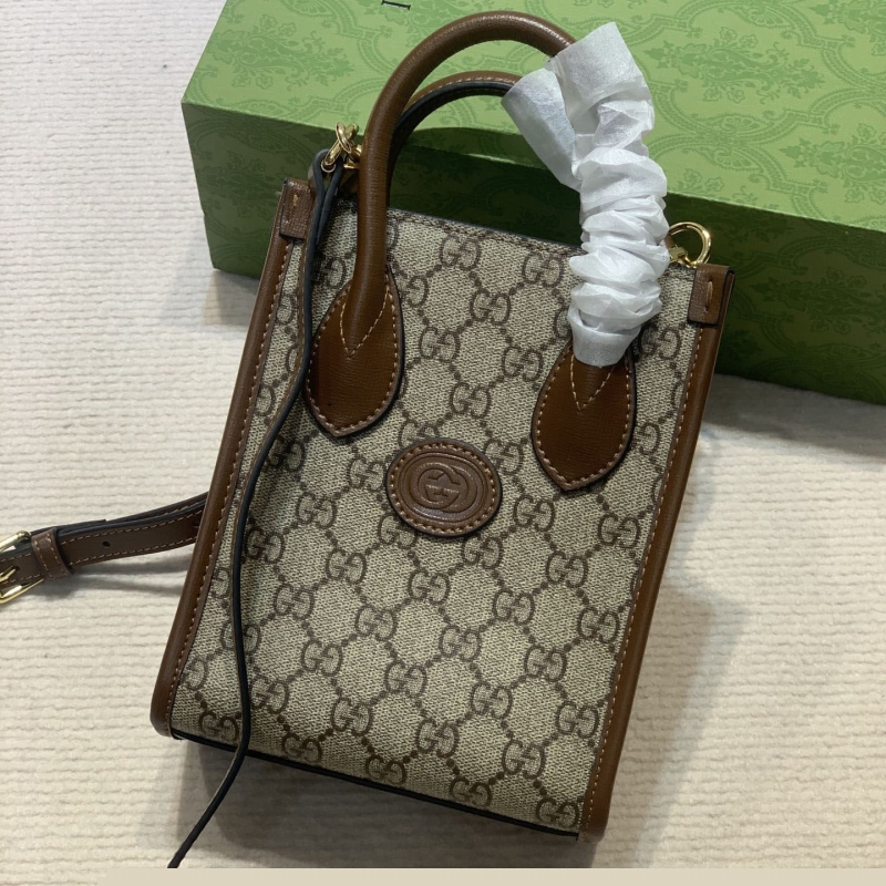 G*u*i top handle bags